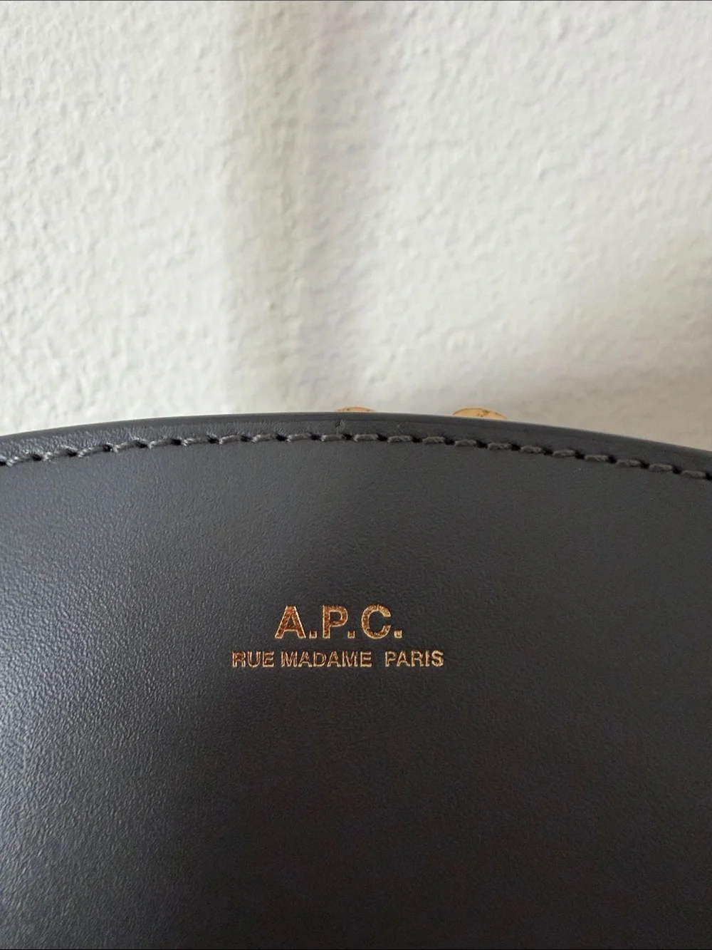 A.P.C. Half-Moon Leather Crossbody Bag in Black with Gold Logo